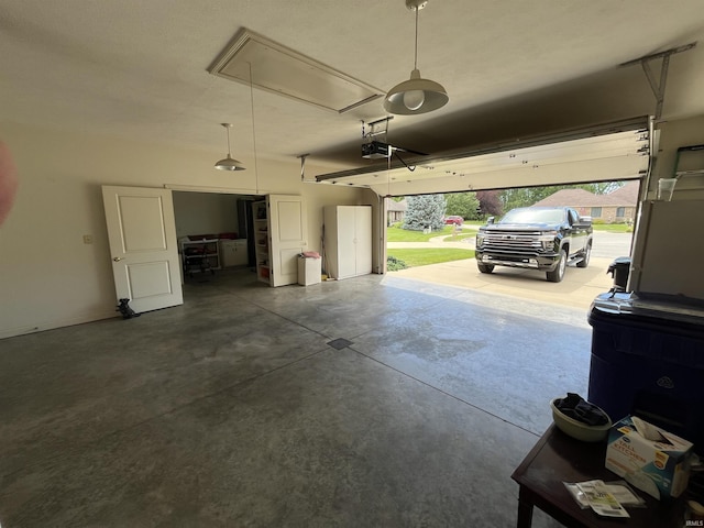 garage featuring a garage door opener