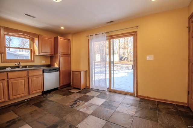 kitchen featuring stainless steel dishwasher and sink