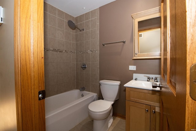 full bathroom with toilet, vanity, tiled shower / bath, and tile patterned flooring