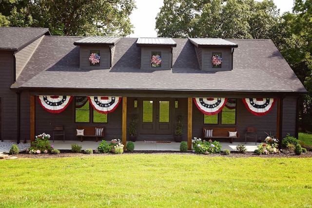 view of front of property with a front lawn and a porch