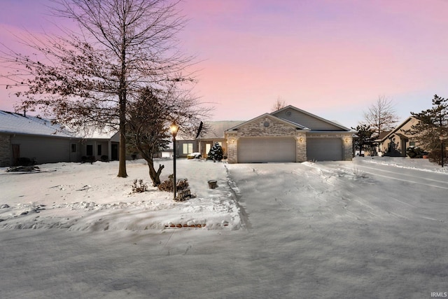 ranch-style home with a garage