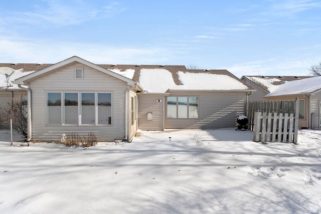 view of snow covered property