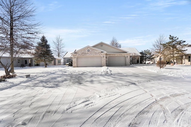 ranch-style home featuring a garage