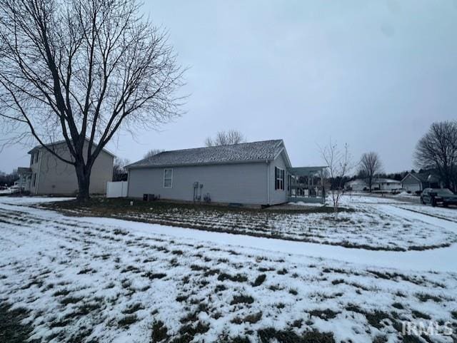 view of snow covered property