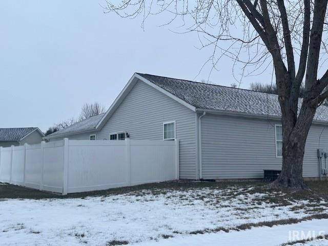 view of snow covered property