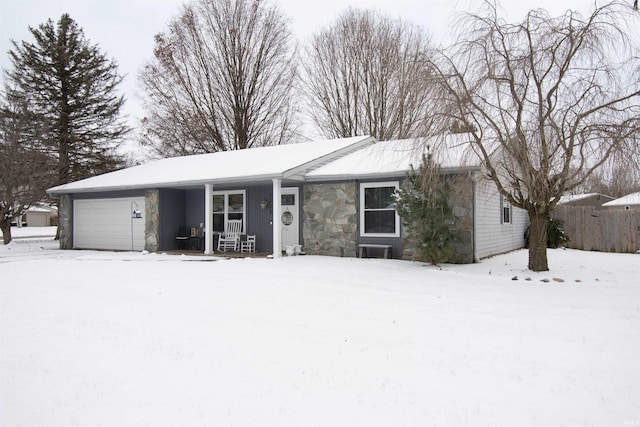 ranch-style home with a garage