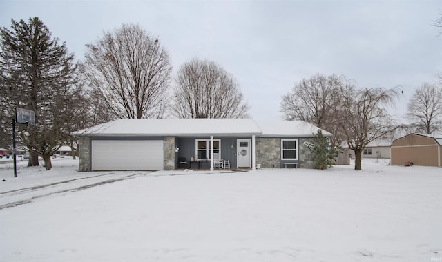 ranch-style house featuring a garage