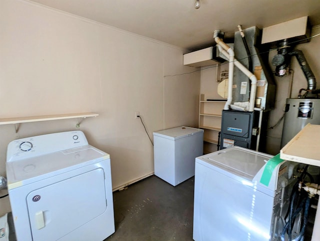 laundry area with washer and dryer and electric water heater