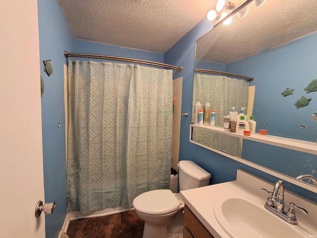 full bathroom featuring toilet, vanity, shower / bath combo, and a textured ceiling