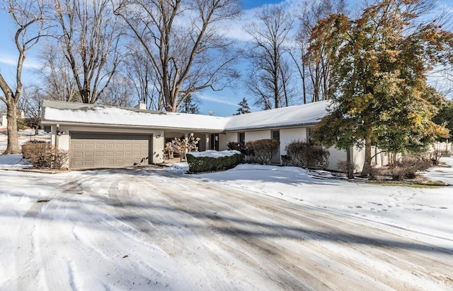 ranch-style house with a garage