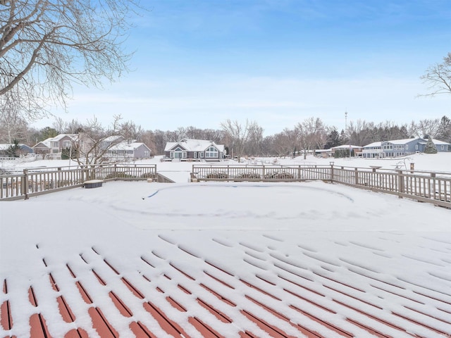 view of yard covered in snow