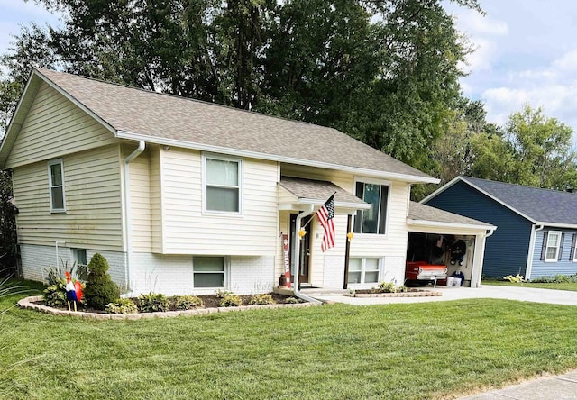 split foyer home with a front lawn and a garage