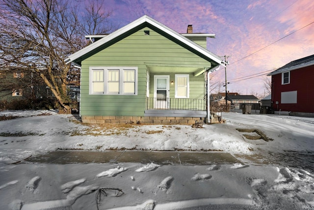 bungalow-style house featuring covered porch