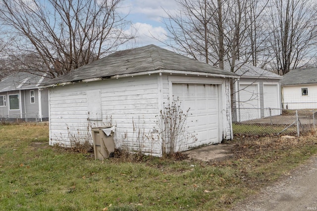 garage with a lawn