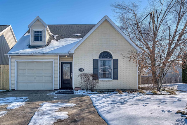 view of front of property featuring a garage