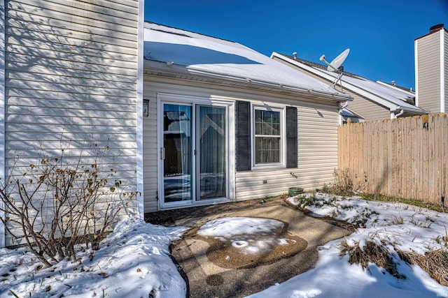 view of snow covered property