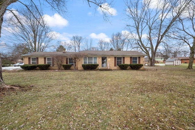 single story home featuring a front yard