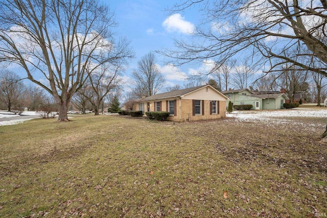 view of property exterior with a lawn