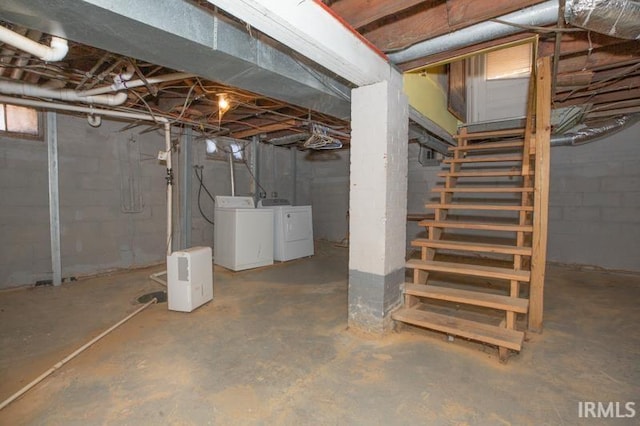 basement with washing machine and dryer