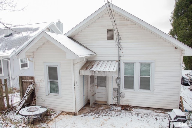 view of snow covered property