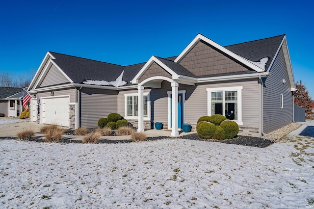 view of front of property featuring a garage