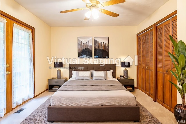 bedroom featuring light carpet and ceiling fan