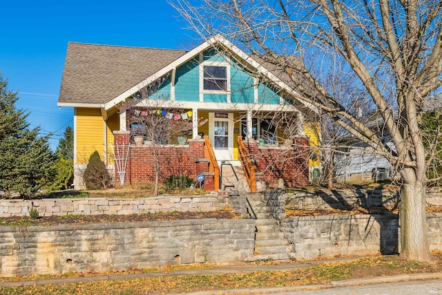 bungalow featuring covered porch