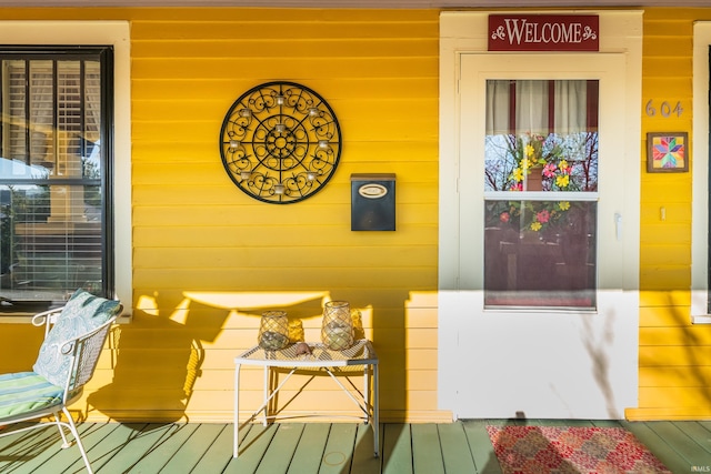 entrance to property with a porch