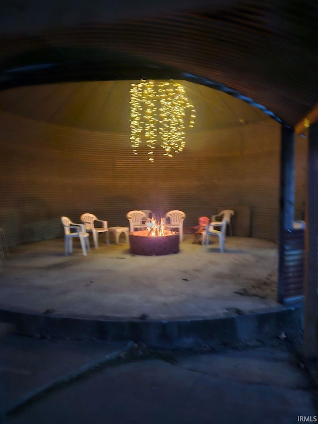 exterior space with an outdoor fire pit