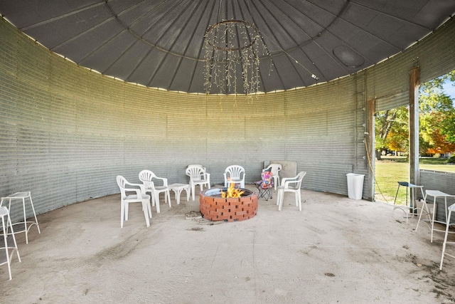 view of patio / terrace featuring a fire pit