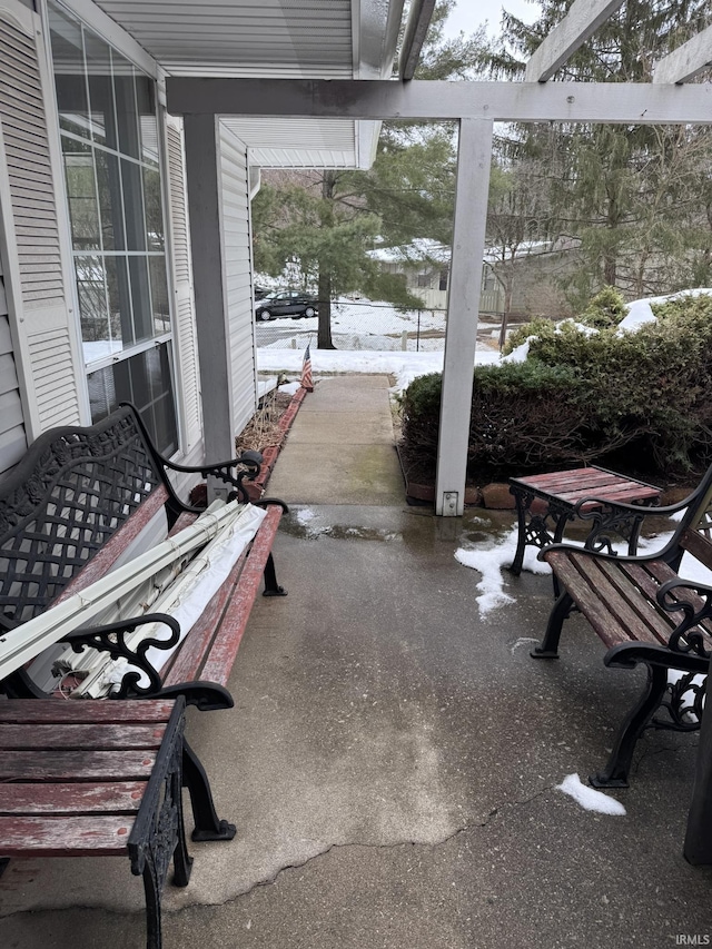 view of snow covered patio