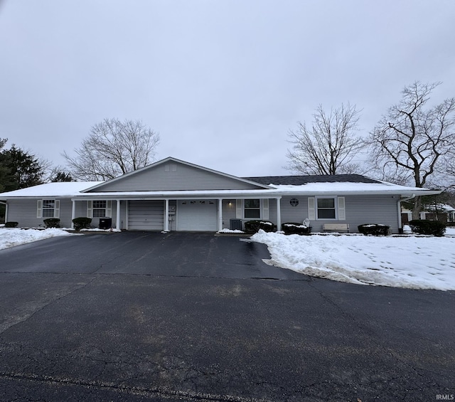 ranch-style home with a garage