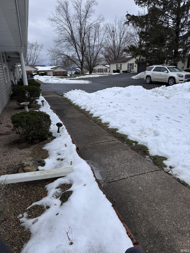 view of yard layered in snow