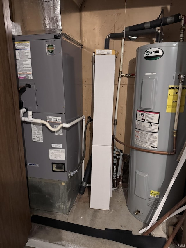 utility room featuring electric water heater and heating unit