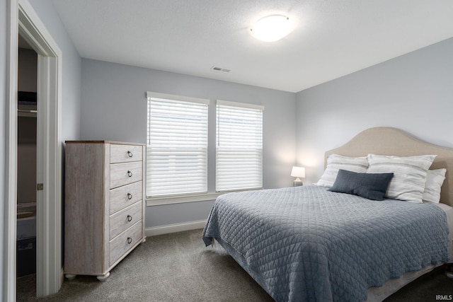 bedroom featuring carpet