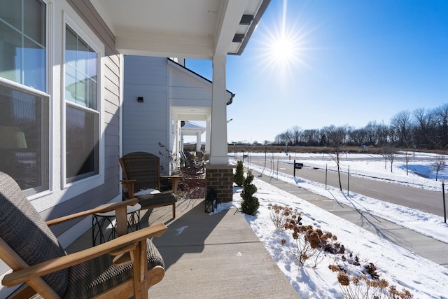 view of snow covered patio