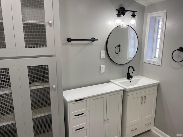 bathroom with a shower and vanity