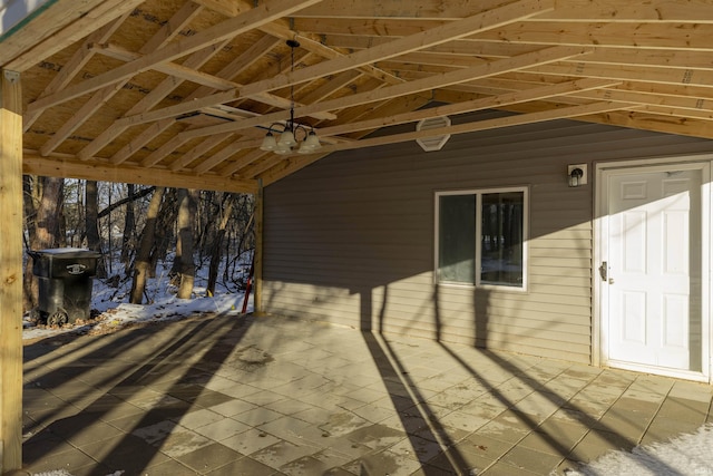 exterior space featuring ceiling fan