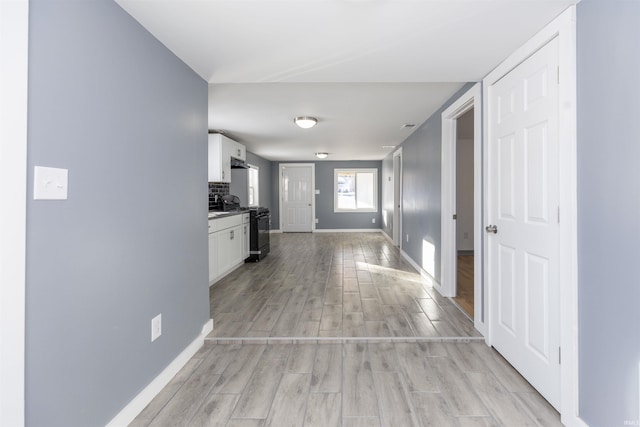 hall featuring light wood-type flooring