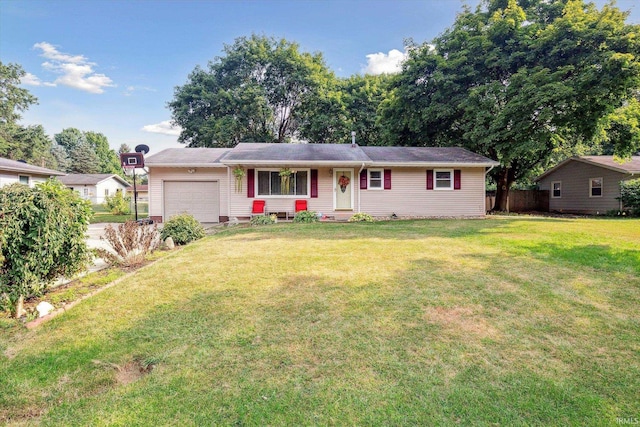 ranch-style home with a garage and a front lawn