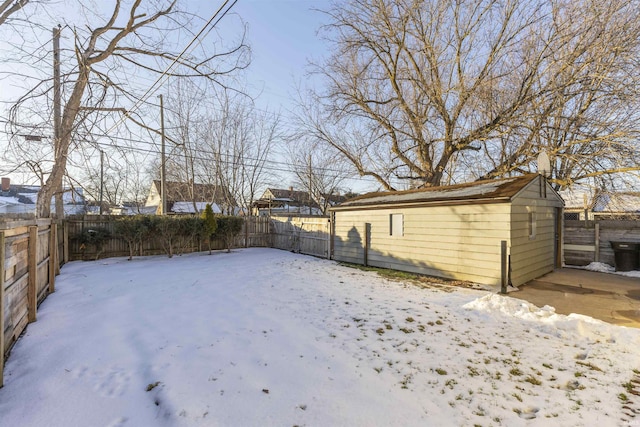 view of yard layered in snow