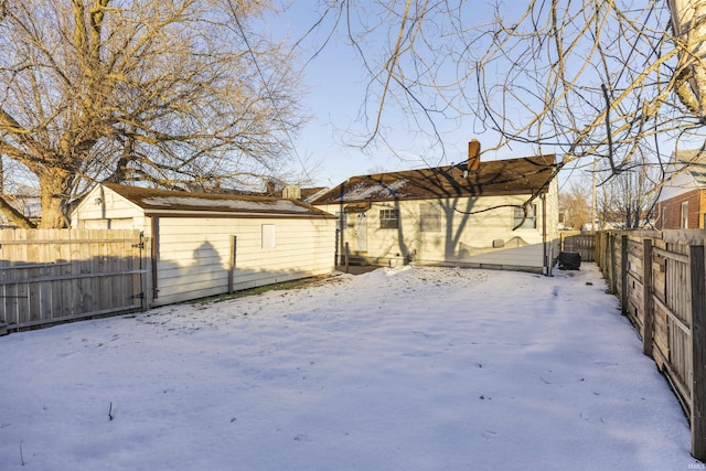 view of snow covered house