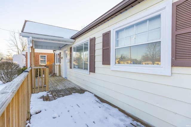 view of snow covered property