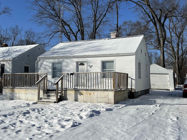 view of front of property with an outbuilding and a garage