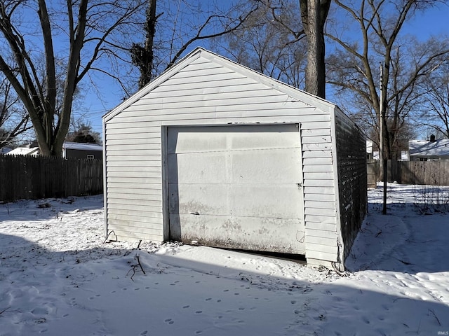 view of snow covered garage