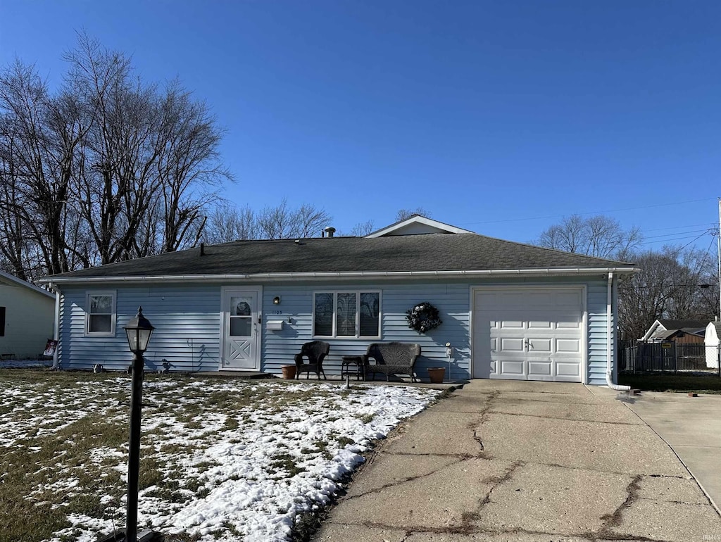 single story home with a garage