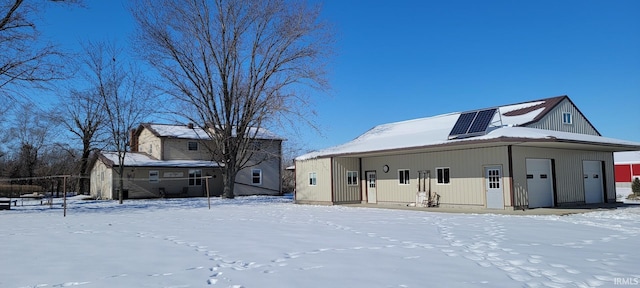 view of front of house featuring solar panels