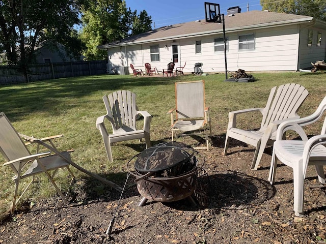 view of yard with an outdoor fire pit