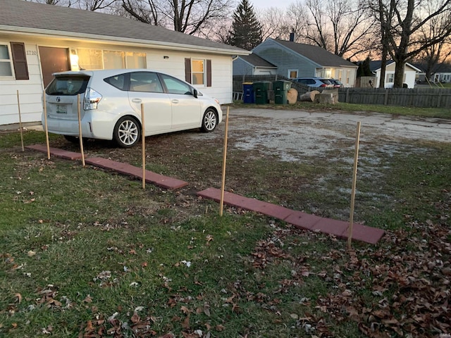 view of yard at dusk