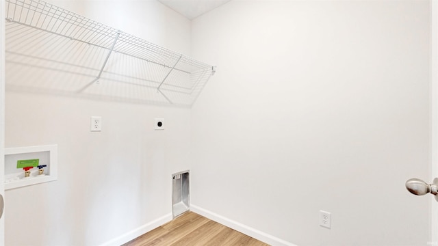 laundry room with wood-type flooring, electric dryer hookup, and hookup for a washing machine